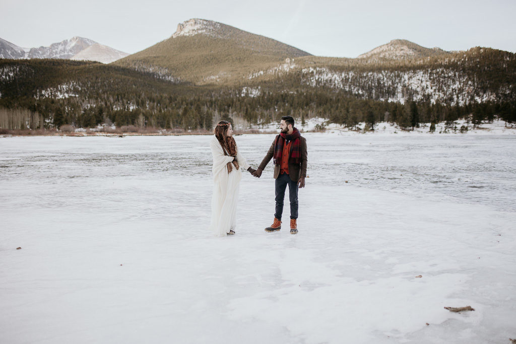 couples portrait on frozen lake