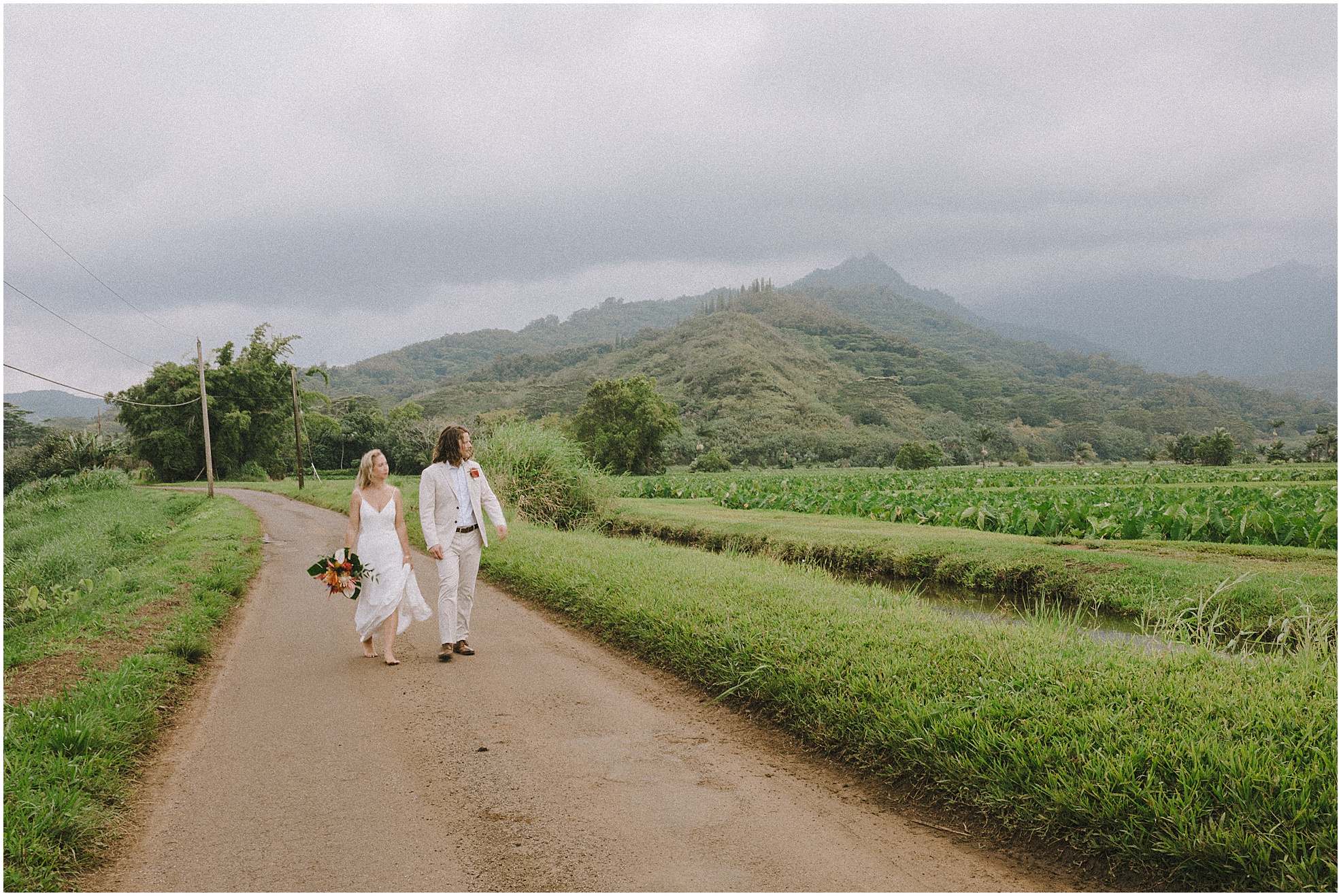Sierra and Elijah celebrated their wedding day on the island of kauai where Sierra grew up. Kauai wedding photographers.